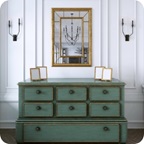 A green antique dresser.